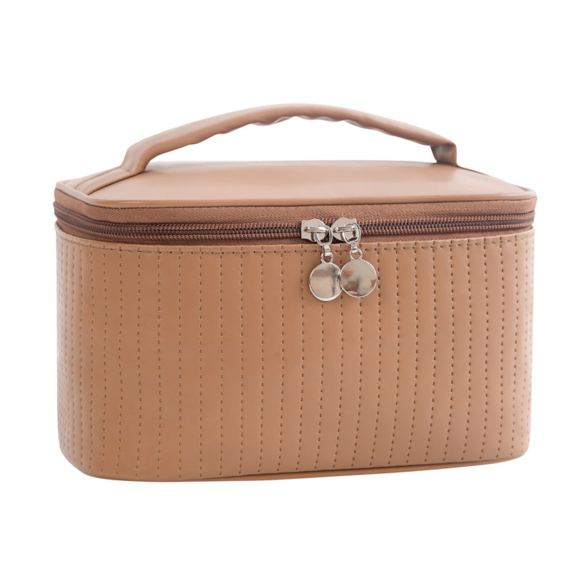 Miorumi Ritual Case cosmetic bag in Coffee, front view with zip closure and carry handle