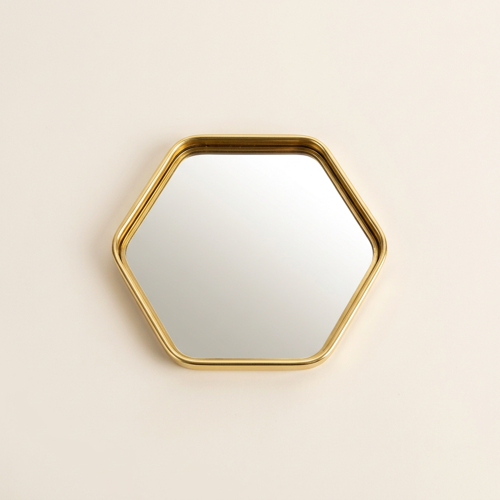 Miorumi Ritual Tray: hexagonal mirrored vanity tray with a gold-tone metal rim on a pale background